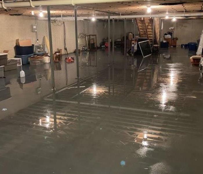 standing water on concrete floor of basement