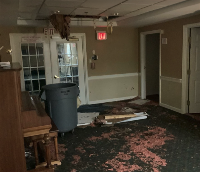 water damage in commercial building and ceiling fallen